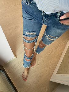 Рваные джинсы XS