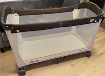 Переносная детская кровать-манеж Graco