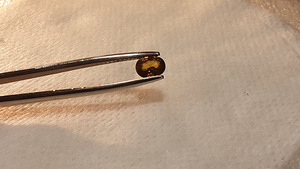 Sphene; looduslik;0,93ct; kollane roheline; Madagaskar; Si-1; (2 foto / 10)