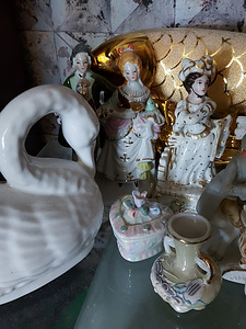 Различные фарфоровые статуэтки (3 фото из 7)