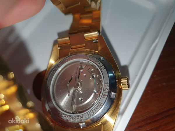 ROLEX,CADISEN GOLD часы (фото #2)