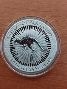 Копия серебряной монеты .