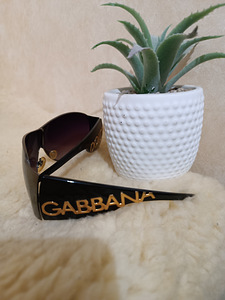 Оригинальные солнцезащитные очки Dolce Gabbana.