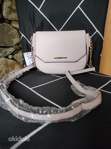 Продам новую очень милую сумочку. Цвет: светло-розовый (фото #1)