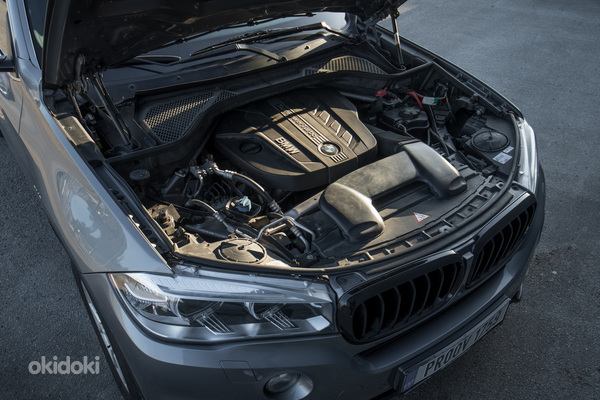 BMW X5 Sportline 3.0 Twin-power Turbo (фото #12)