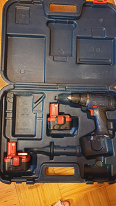 Akutrell Bosch gsr 14.4v + kohver (1 foto / 2)
