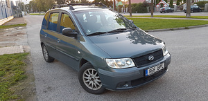 Hyundai Matrix (8 фото из 9)