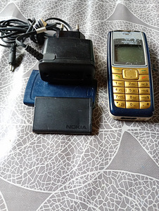 Nokia telefon nuppudega+ laadia (1 foto / 3)