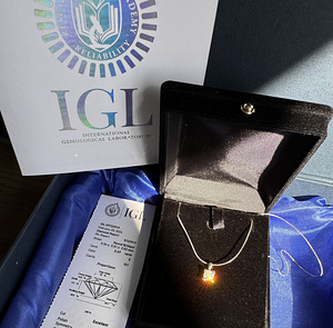 18k / 750 kuld / Looduslik teemant 0,69ct + IGL sert (2 foto / 2)