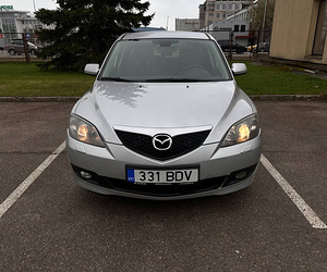 Mazda 3 1.6 77кВт (2 фото из 15)
