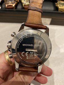 Michael Kors käekell (hübriid), meeste (3 foto / 3)