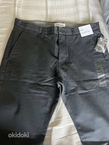 Новые брюки Calvin Klein. Размер 32/32