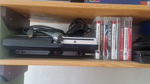 PS3 Fat 80GB + 8 игр (1 фото из 3)