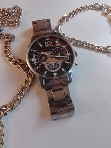 Miesten rannekello ja kaulakoru ja rannekoru (1 valokuva sivusta 4)