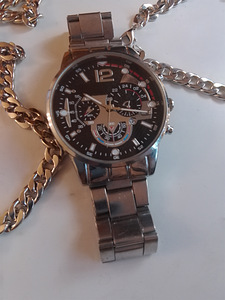 Miesten rannekello ja kaulakoru ja rannekoru (2 valokuva sivusta 4)