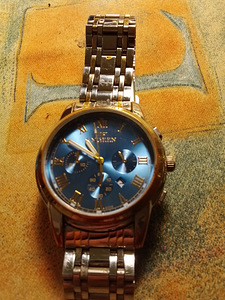 METALLI RANNEKELLO (2 valokuva sivusta 2)