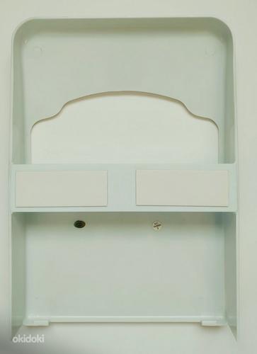 Диспенсер для одноразовых салфеток на сиденье унитаза (фото #2)