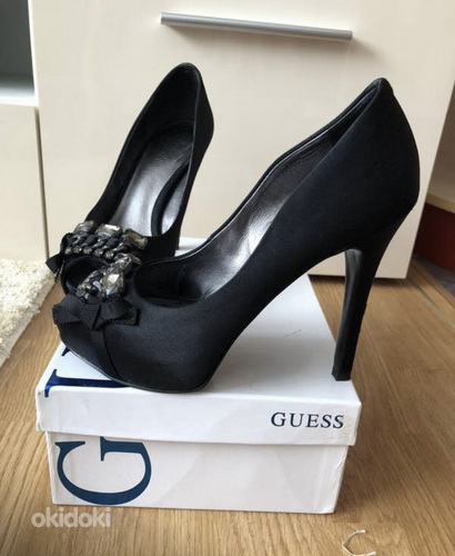 Guess kingad 38