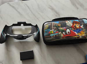 Sony PS Vita + 2 mängu + lisatarvikud (6 foto / 6)