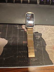 Фитнес-трекер Huawei Band 7 (золото/розовый) (1 фото из 3)