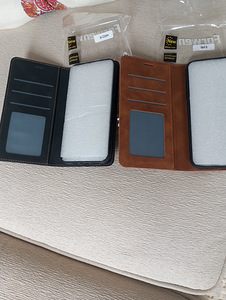 Kaaned iPhone 11,12 uued, nahast ümbrised (1 foto / 3)
