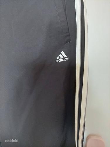 Uued Adidas Õhukesed püksid 42-44 (фото #2)