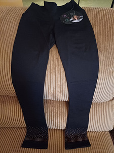 Iluuisutamise trennipüksid ja jakket . Suurus 150 (5 foto / 5)