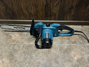 Elektrikettsaag Makita UC4041A (3 foto / 5)