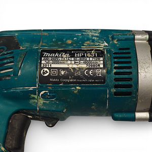 Дрелль Makita HP1631 + ящик (4 фото из 4)