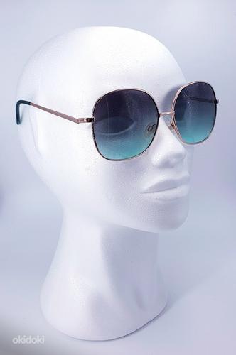 Солнцезащитные очки (фото #4)