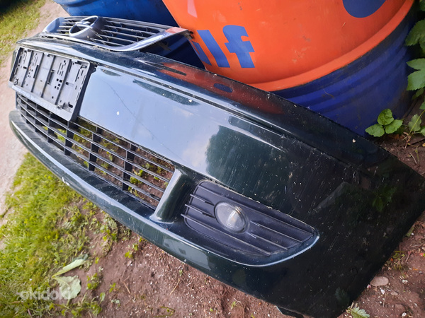 Opel Vectra B рестайлинг передняя решетка радиатора фары (фото #6)