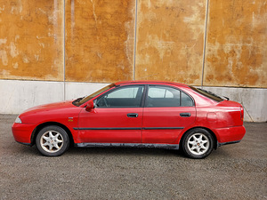 Mitsubishi Carisma Gdi manu sõidukorras 700 tingi (10 foto / 10)