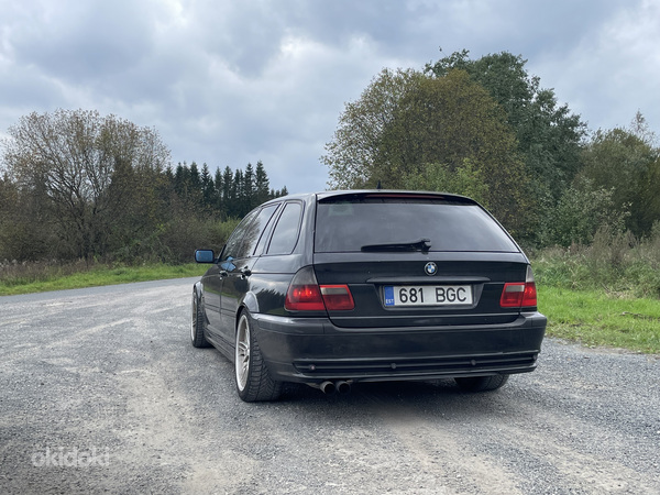 BMW 330dA 135 кВт (фото #6)