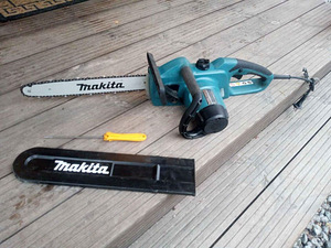 Elektrisaag Makita UC4041A (2 foto / 4)