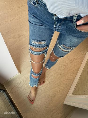 Рваные джинсы XS (фото #1)