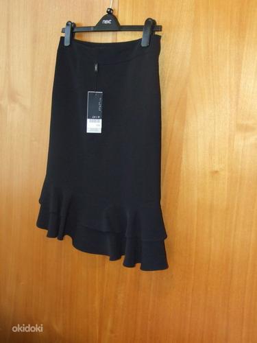 Новая черная юбка с воланами (фото #2)