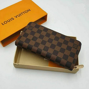 Uued rahakotid Louis Vuitton, Gucci (5 foto / 9)
