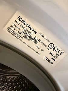 Встраиваемая стирально-сушильная машина Electrolux 10/4 кг 1 (5 фото из 6)