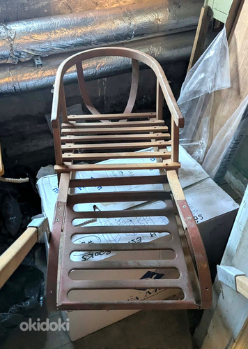 Vanaaegne puidust metalldetailidega laste kelk