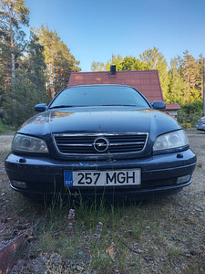 Opel omega (4 фото из 8)