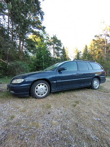 Opel omega (5 фото из 8)