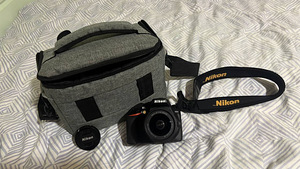Nikon D3500 + комплектный объектив + сумка для камеры и друг (4 фото из 5)