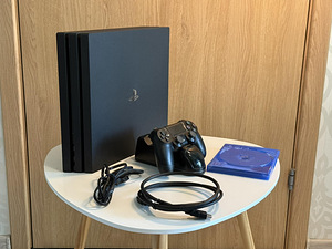 PlayStation 4 Pro (1TB) + Mängupuldi laadija!