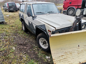 Nissan Patrol с ковшом (2 фото из 7)