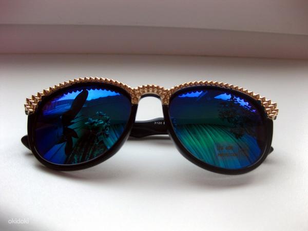 Модные солнцезащитные очки (фото #1)