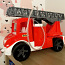 Детская игрушка в виде красной пожарной машины (фото #1)