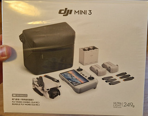 DJI Mini 3 (RC) + fly more combo (1 foto / 3)