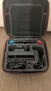 Nintendo Switch OLED + Дорожный футляр + Игры (2 фото из 6)