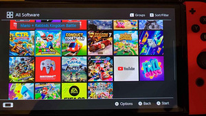 Nintendo Switch OLED + Дорожный футляр + Игры (5 фото из 6)