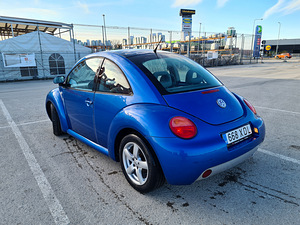 Volkswagen New Beetle (9 foto / 14)